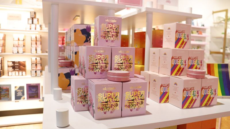 A stack of pink candle boxes.